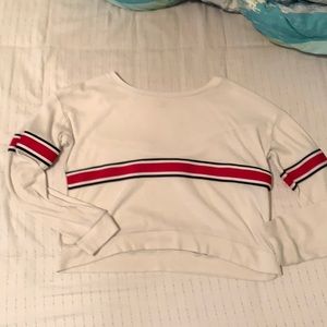 white with red stripe, slightly cropped, long sleeve.